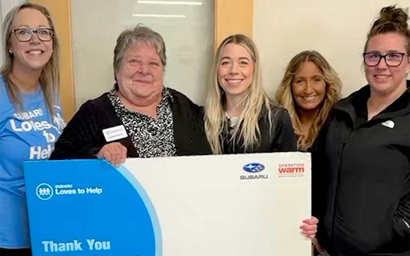 People holding a sign